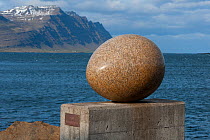 Sculpture of Skua egg (Stercorarius parasiticus) 'Eggin i Gledivik?' by Siguraur Guamundsson, ?34 giant granite eggs along the coast? at Djupivogur, Iceland, June 2011.