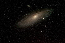 Andromeda galaxy and and sister galaxies M110 above and M32 below. Taken from eastern Colorado, USA, September 6-7 2013. Image taken with digital image stacking.