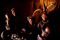 Group portrait of Ovahakaona mothers with babies, Kaokoland, Namibia.