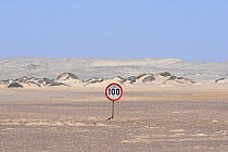 Traffic sign speed limit in the desert of the Skeleton Coast National Park, Namibia, September 2013.