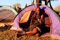 Camping tents used for sleeping inside a Himba village. Kaokoland, Namibia, September 2013.