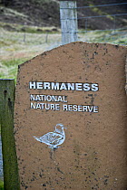 Hermaness National Nature Reserve sign at entrance, Shetland, Scotland, May 2013.