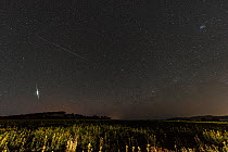 Stars facing north towards constellation Perseus with Perseid meteor shower, above farming fields in the Atherton Tablelands, Far North Queensland. August 14, 2013 4am, composite image.