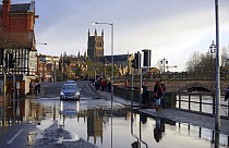 View of Worcester Cathedral with flooded road in the foreground, Worcester, England, UK, February 2014.