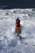Stormy seas at the Pierres Noires lighthouse, Le Conquet, Armorique Regional Park. Finistere, Brittany, France, Iroise Sea. February 2014.  France, Bretagne, Finistere, Mer d'Iroise, parc naturel re...