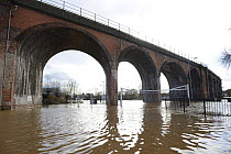 Railway viaduct in Worcester during the highest recorded floods, England, UK. 13th February 2014.
