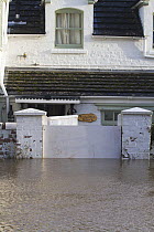 House with flood gate during the February 2014 floods, Upton upon Severn, Worcestershire, England, UK, 9th February 2014.