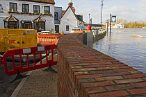 Brick flood protection barrier built following 2007 floods, taken during the February 2014 flooding, Upton upon Severn, Worcestershire, England, UK, 8th February 2014.