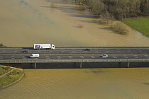 Aerial view of floods surrounding M50 motorway with bridge over River Severn, during February 2014 flooding Worcestershire, England, UK, 7th February 2014.