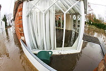 Fish eye view of conservatory of flooded house, showing water inside and outside, during the February 2014 floods, Upton upon Severn, Worcestershire, England, UK, 9th February 2014.