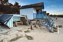 Destroyed and damaged beach huts after the 6th December east coast tidal surge, Holkham beach, Wells-next-the-Sea, Norfolk, England, UK, December 2013.