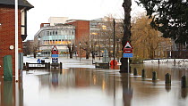 Car park flooded by River Wey, with cars almost completely submerged during Christmas 2013 flooding, Guildford. Surrey, England, UK. 25th December 2013.