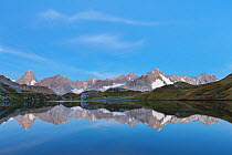 Fenetre Lake  / Lac de Fenetre in Swiss Alps, 2456 m above sea level. Mont Blanc, Grande Jorasses, Aiguille du Talefre, Aiguille du Triolet and Mont Dolent in Ferret Valley (Val Ferret) beyond. Canton...