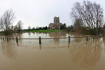Fisheye view of Tewkesbury Abbey amidst January 2014 flooding, Gloucestershire, England, UK, 8th January 2014.