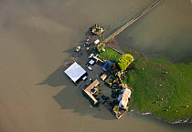 Farm surrounded by extensive January 2014 floods in Somerset Levels, near Langport, England, UK, 9th January 2014.