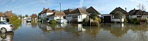 Flooded street in Weybridge, Surrey, England, UK, 10th February 2014.
