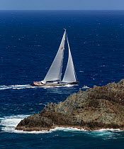 Mega yacht sailing around the island in St. Barths during the Bucket Regatta, March 2013, Caribbean. All non-editorial uses must be cleared individually.