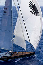 Mega yacht racing with spinnaker out during the 2013 St. Barths Bucket Regatta, March 2013, Caribbean. All non-editorial uses must be cleared individually.