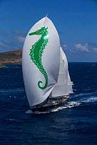 Mega yacht under spinnaker during the 2013 St. Barths Bucket Regatta, Caribbean, March 2013. All non-editorial uses must be cleared individually.