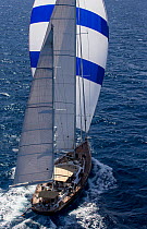 Mega yacht under spinnaker during the 2013 St. Barths Bucket Regatta, Caribbean, March 2013. All non-editorial uses must be cleared individually.