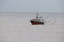 Trawler boat off the coast, Norfolk, England, UK, October 2013