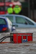 Emergency services pumping floodwaters, after sea defences were breached at Splash Point in Rhyl, Denbighshire, Wales, 5th December 2013.