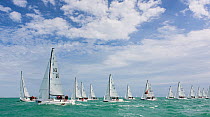 A fleet of sailing boats racing together during Key West Race Week 2013, Florida. All non-editorial uses must be cleared individually.