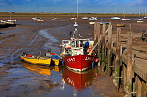 Boats at low tide, Brancaster Staithe, Norfolk, UK, September 2013