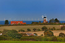 Windmill and North sea wind farm, Weybourne, Norfolk, UK, September 2013.