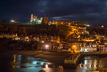 View of Whitby Harbour at night, Yorkshire, England, UK, September 2013.