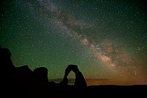 Delicate Arch and Milky Way at night, Arches National Park, Utah, USA, July 2012.