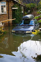 Car stranded in February 2014 floods from the River Thames, Sunbury on Thames, Surrey, England, UK, 15th February 2014.