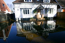 Flooded home during February 2014 floods, Runnymede, Surrey, England, UK, 16th February 2014.