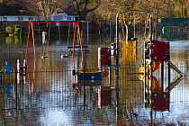 Flooded playground during February 2014 flood, Surrey, England, UK, 16th February 2014.