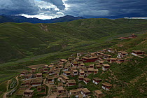 Rewu Tibetan monastery, on mountain slope, Daocheng, Sichuan Province, Qinghai-Tibetan Plateau, China, August 2010.