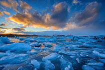 Ice floating on Jokulsarlon glacial lake, Vatnajokull glacier, Iceland, November 2012.