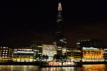 The Shard and London Bridge Hospital at night, viewed from the River Thames, London, September 2013.