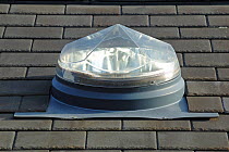 Sun tube or pipe by Sunpipe, set into the tiled roof of the Islington Ecology Centre to allow natural light into the building thus saving on energy, Highbury, London Borough of Islington, England, UK,...