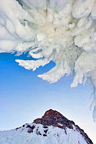 Ice splash out formation with icicles, Lake Baikal, Siberia, Russia, March