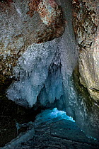 Cave with icicles / ice stalactites on the ceiling,  Lake Baikal, Siberia, Russia, March.