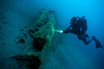 Diver on the bow of U-Boat -U352. Type VIIC sunk off Cape Lookout on the 9th May 1942, North Carolina, USA, September 2013.
