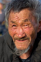 Portrait of Nikolai Votgyrgin, an elderly Chukchi reindeer herder. Iultinsky District, Chukotka, Siberia, Russia. July 2013.