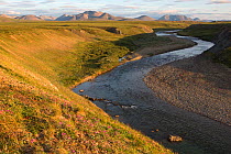 The Matachingay River valley with mountains of the Chukotsky Range in the background in evening light. Iultinsky District, Chukotka, Siberia, Russia. July 2013.