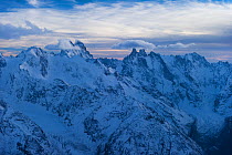 Ushba twin peak and main ridge of Caucasus Mountains, Kabardino-Balkaria, Central Caucasus Mountains, Russia, October 2012.