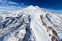 Elbrus twin peak with glaciers, dormant volcano, Kabardino-Balkaria, Northern Caucasus Mountains, Russia, October 2013.