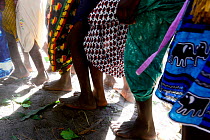 Feet of people dancing at wedding in the village of Ambeduco. Orango Island, Guinea-Bissau, December 2013