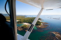 Aerial view out of float plane, of the Vancouver Island  coastline, Vancouver Island, British Columbia, Canada, July.