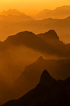 Brienzer Rothorn mountain silhouetted at dawn, Bernese Alps, Switzerland, July 2013.