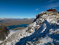 View fron Fanaraken peak (2080 m) with Norwegian Trekking association cottage, over Sognefjell mountain range, Jotunheimen nat park, Norway, September 2009.