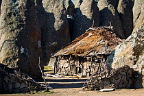 Hut in amongst the granite formations of Rafu. Bale Mountains National Park, Ethiopia, December 2011.